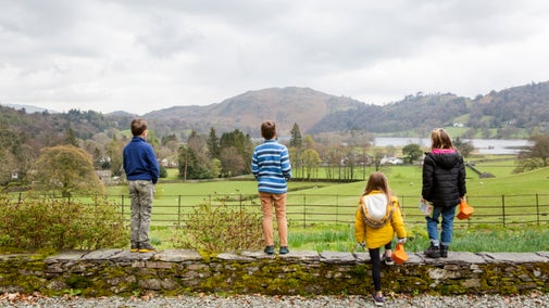 Children looking out at the autumn view from Allan Bank in Grasmere